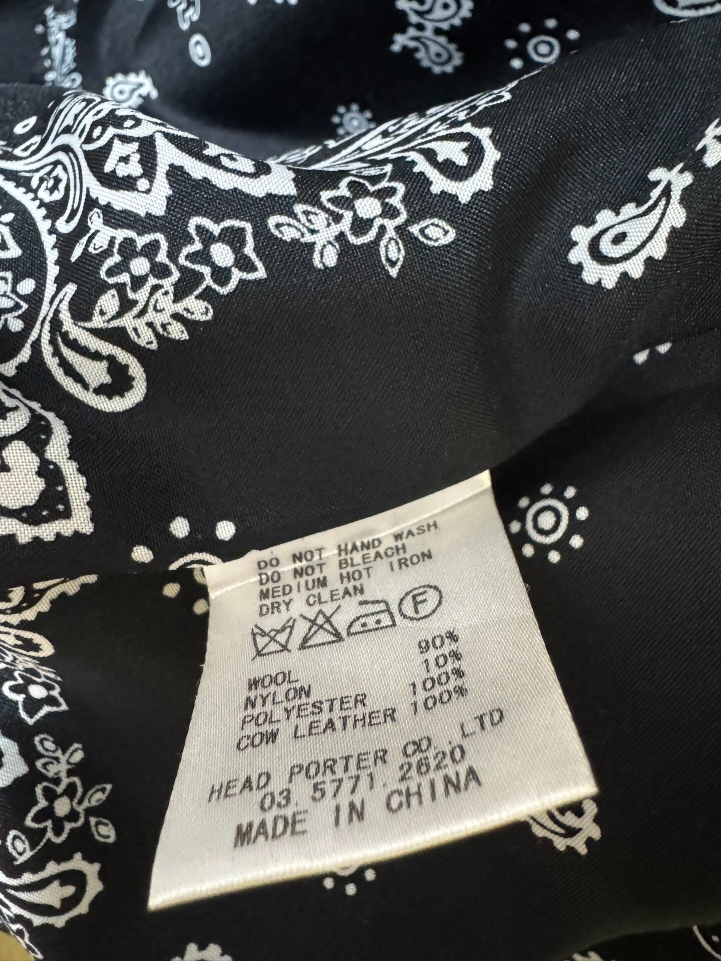 Head Porter Plus A2 Wool Coat — label