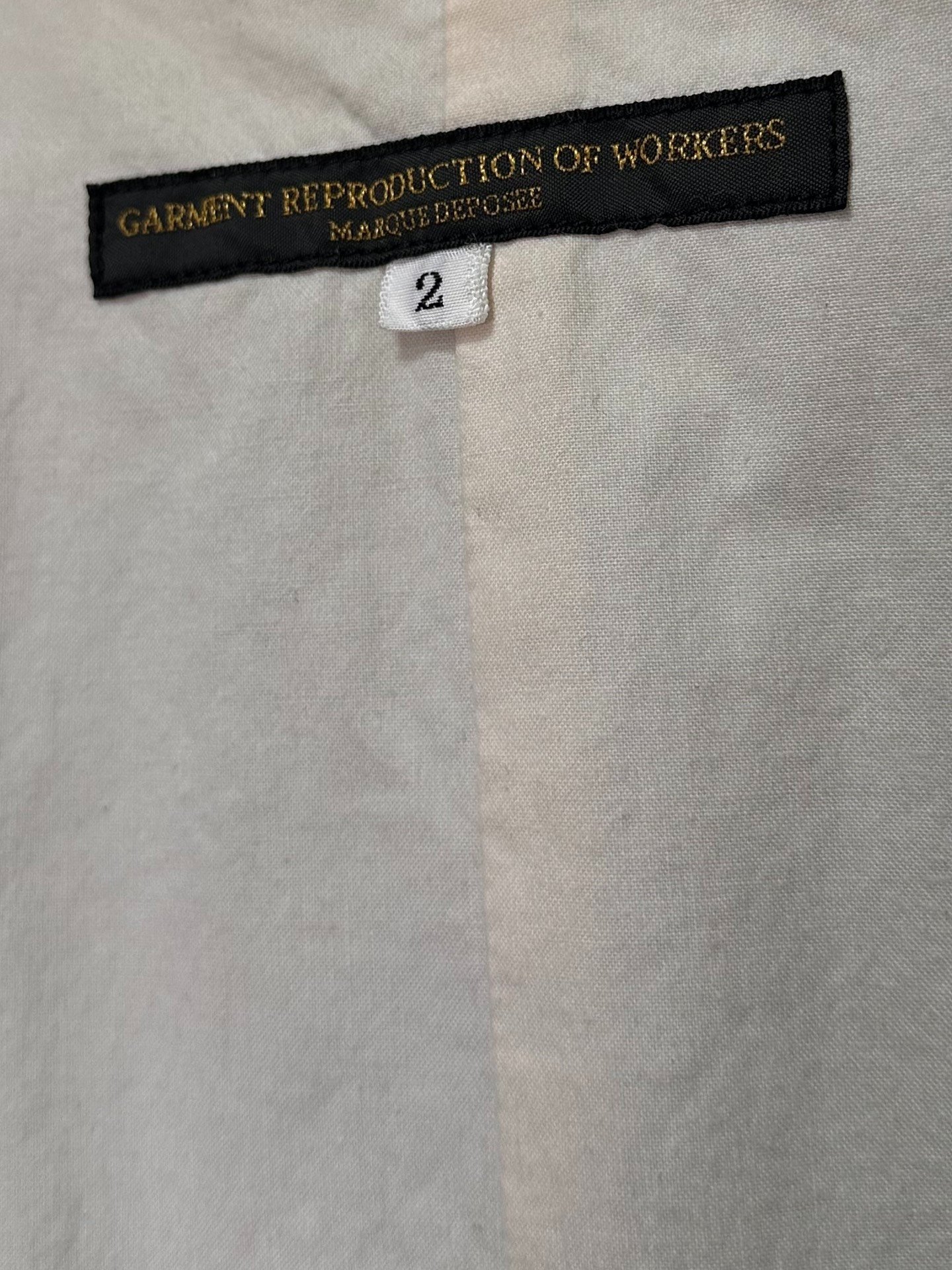 Workers' Reproduction Linen Long Coat — label
