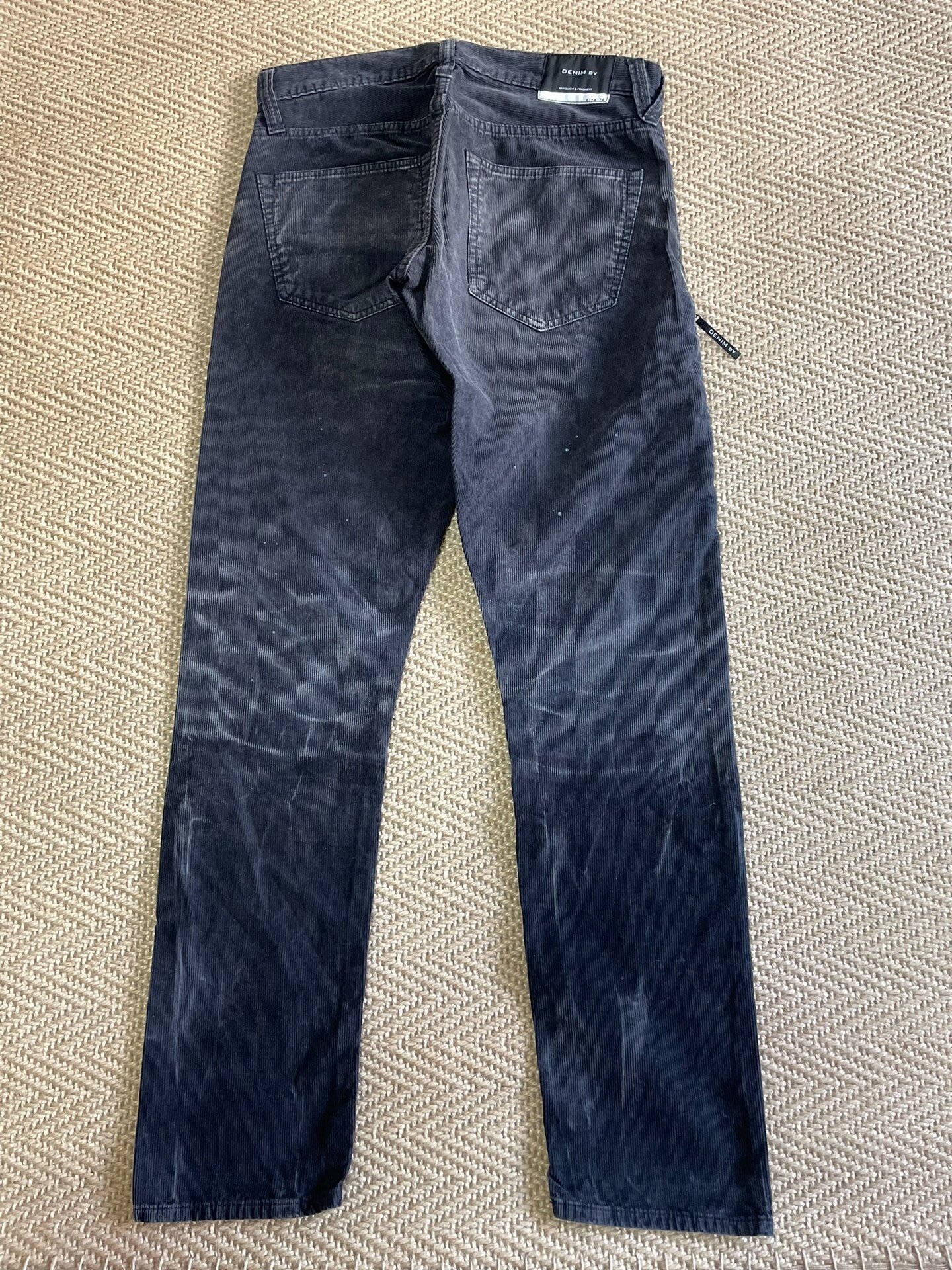 DENIM BY VANQUISH & FRAGMENT Washed Distressed Corduroy Pants — front