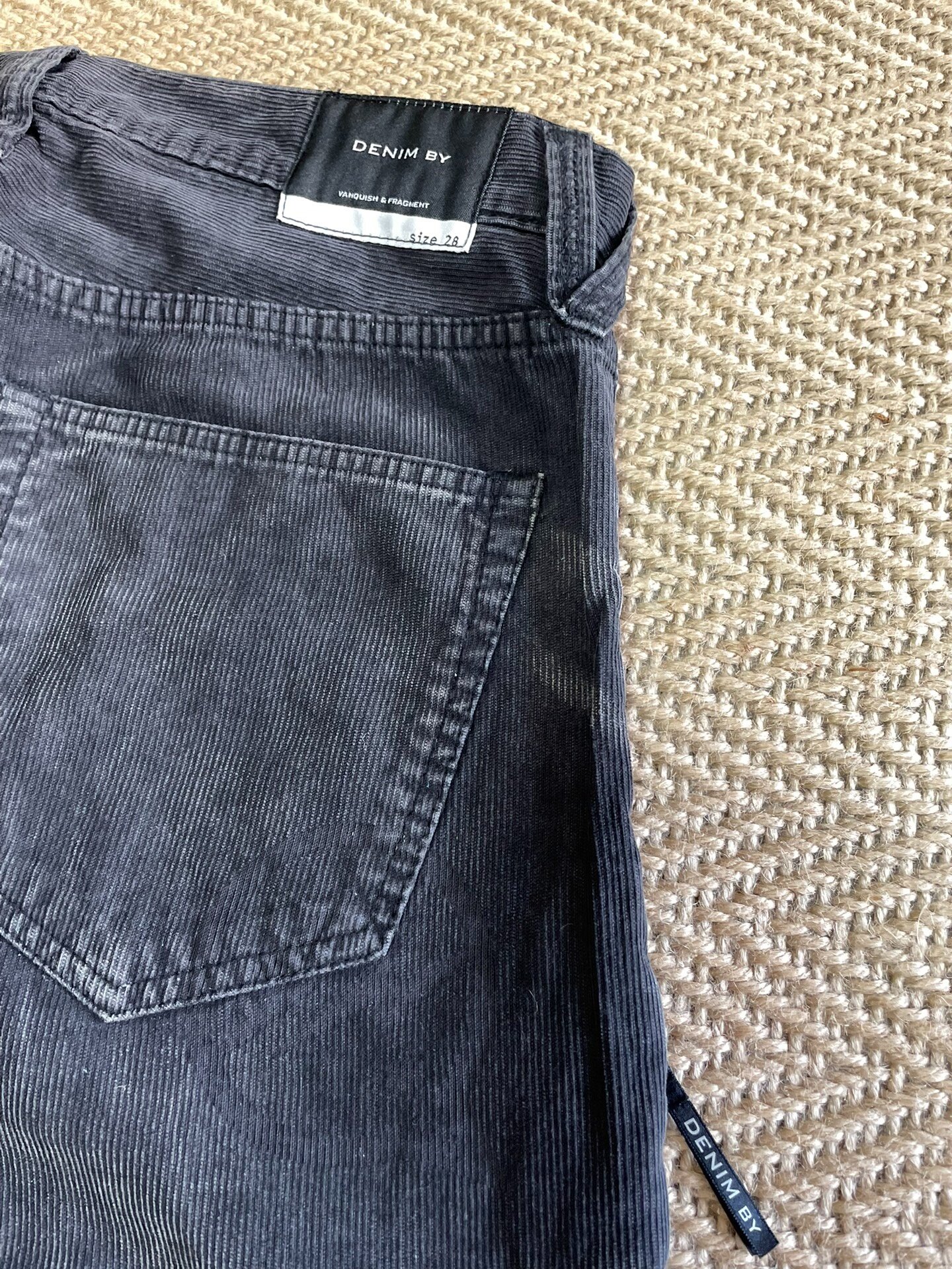 DENIM BY VANQUISH & FRAGMENT Washed Distressed Corduroy Pants — back