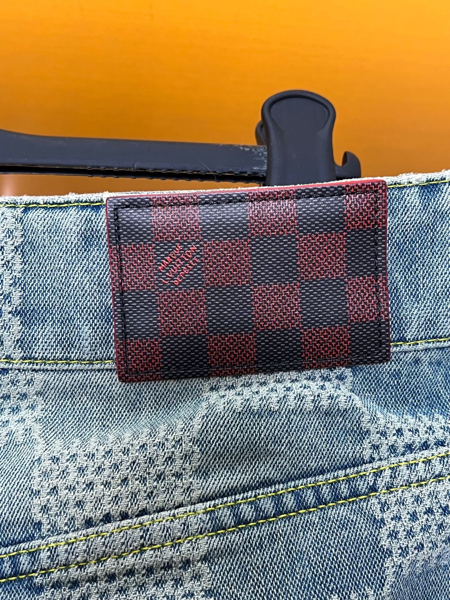 Louis Vuitton Pharrell Checkered Flared Jeans — label