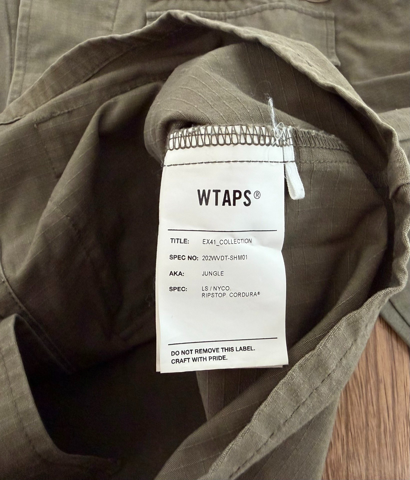 WTAPS JUNGLE LS NYCO.CORDURA Four-Pocket Shirt — label