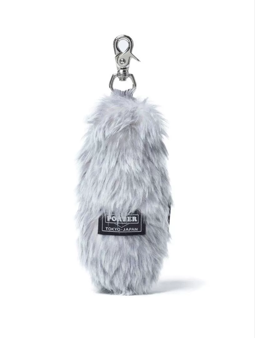 PORTER BROOM 90th Anniversary Plush Accessory — label