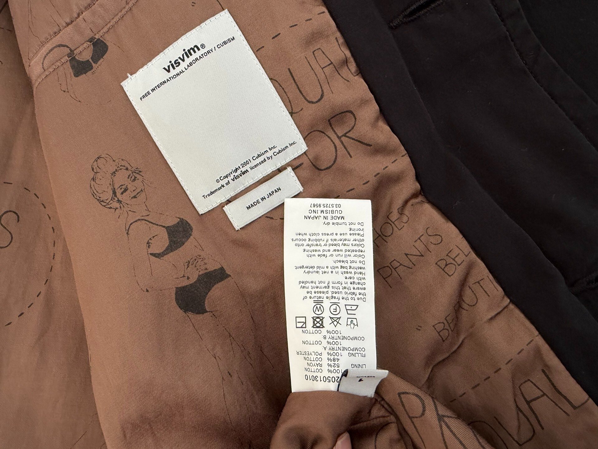 VISVIM NAPIER DRIVING COAT — label