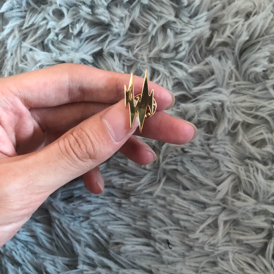 Saint Laurent Lipstick Lighter Shield Brooch — back
