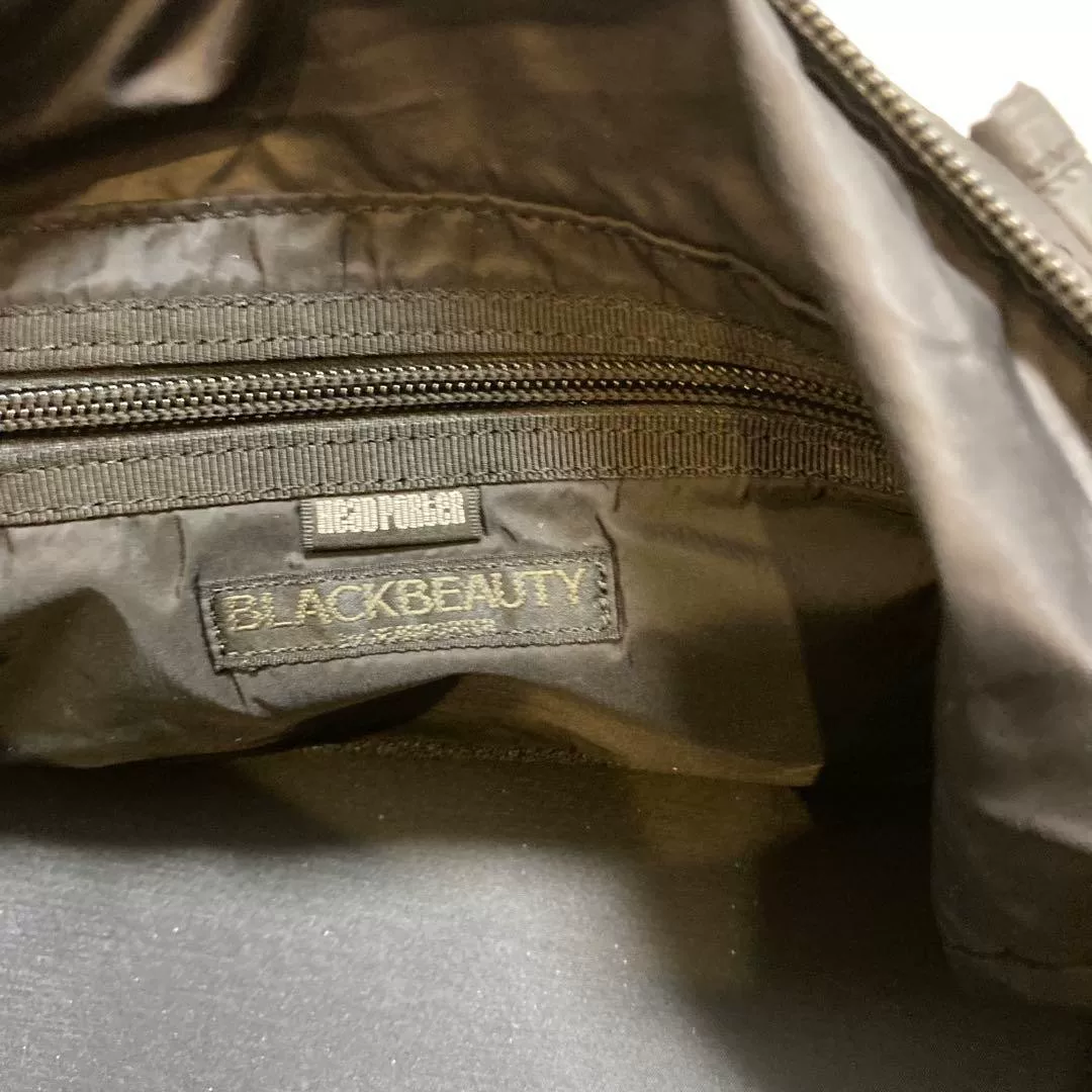 Head Porter Black Beauty Checkered Duffle — label