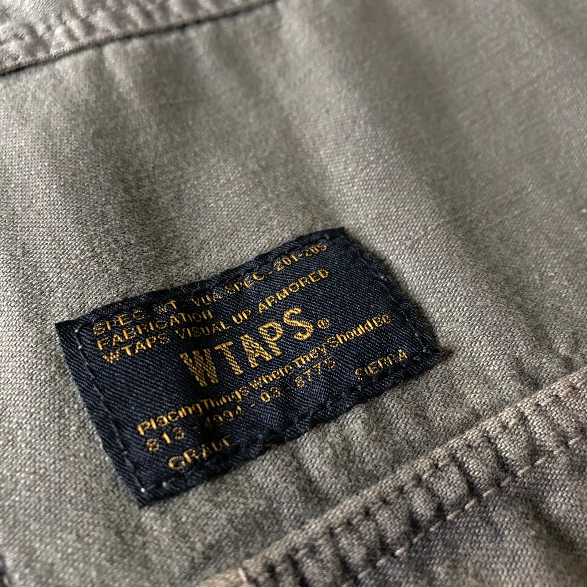 WTAPS 13AW Batik Four-Pocket Olive — label