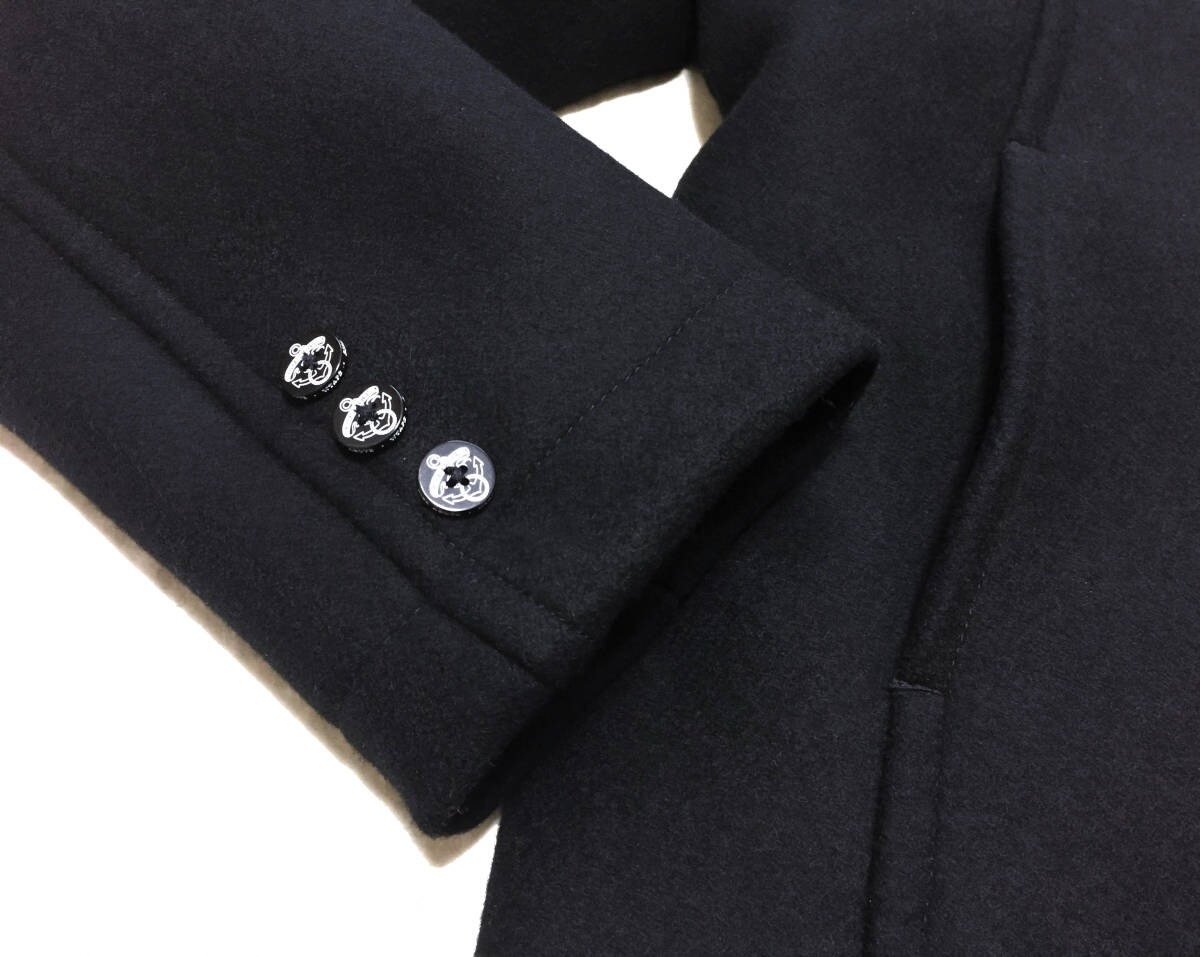 WTAPS Black Watch Coat — label