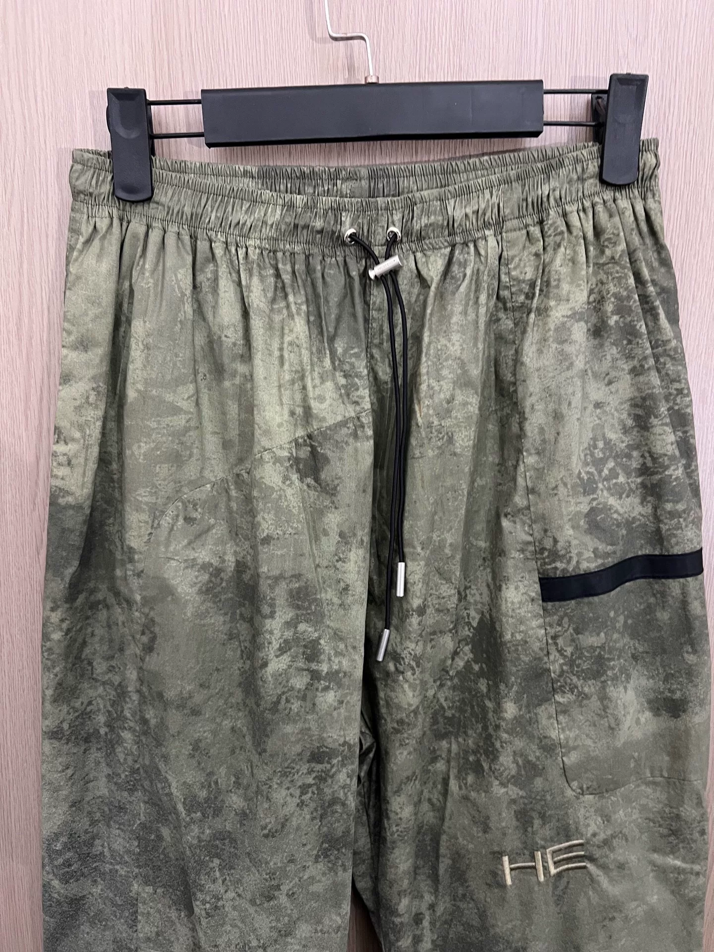 Heliot Emil Silver Reflective Cargo Pants — label