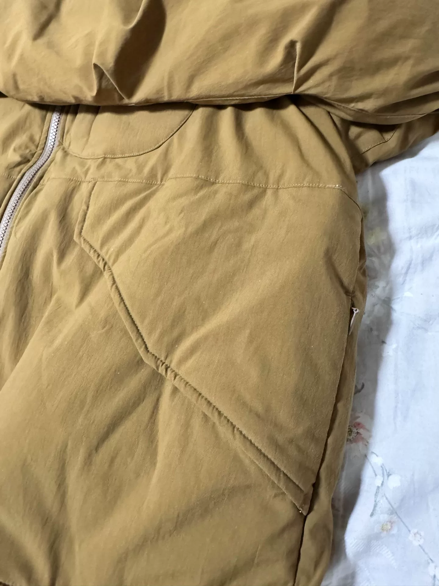 Daiwa 22aw Functional Waterproof Jacket — label