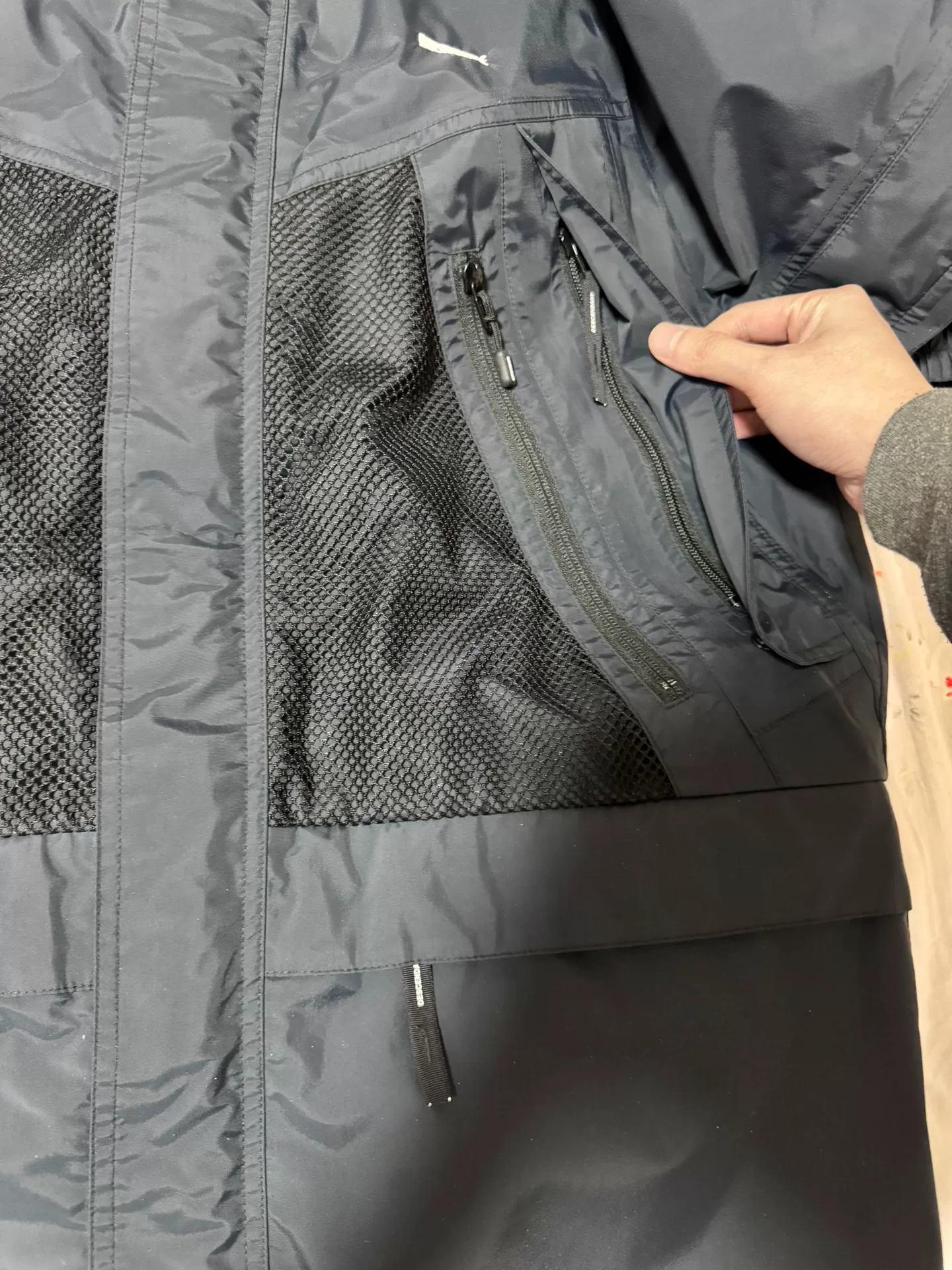 Descendant 19ss DCDT Functional Waterproof Jacket — label