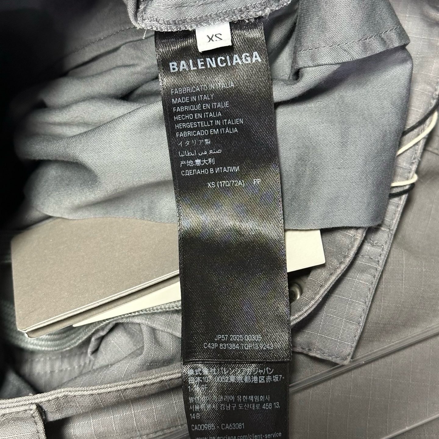 Balenciaga SS25 Distressed Cargo Shorts — label
