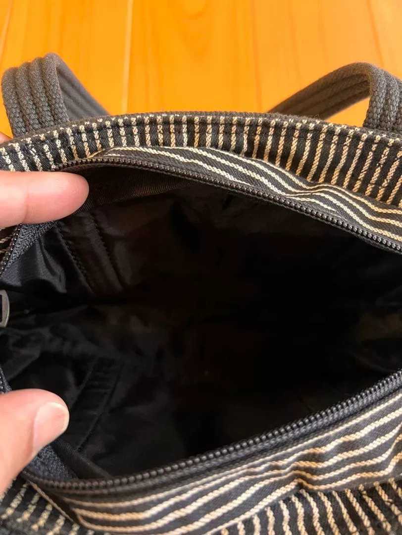 NEIGHBORHOOD x PORTER Mini Tote — label