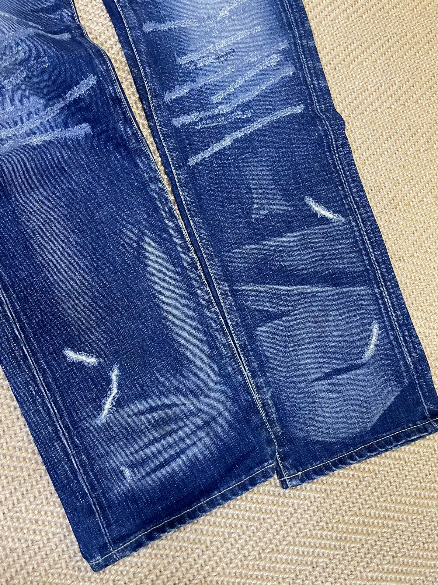 NEIGHBORHOOD Washed Distressed Jeans — detail