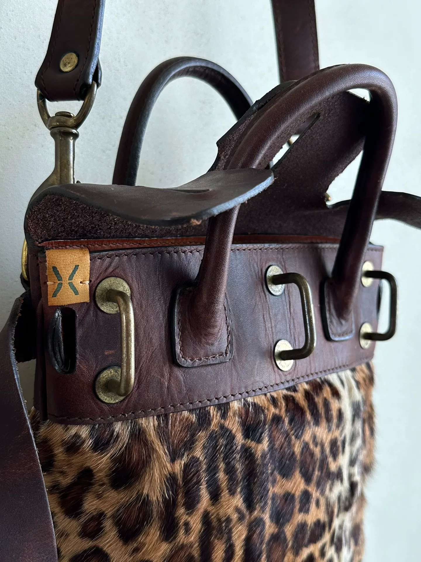 Visvim Mail Satchel XXS Leopard — label