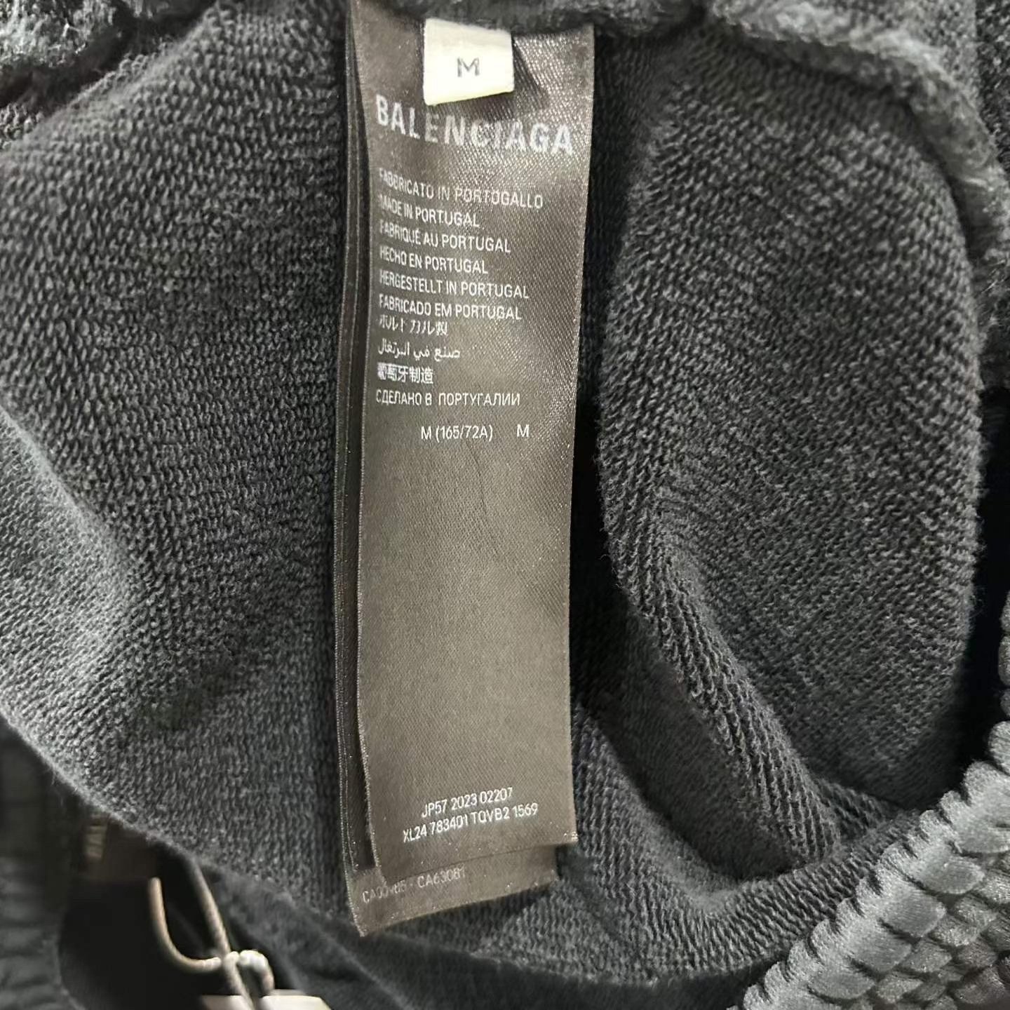 Balenciaga Distressed Embroidered Track Pants — label