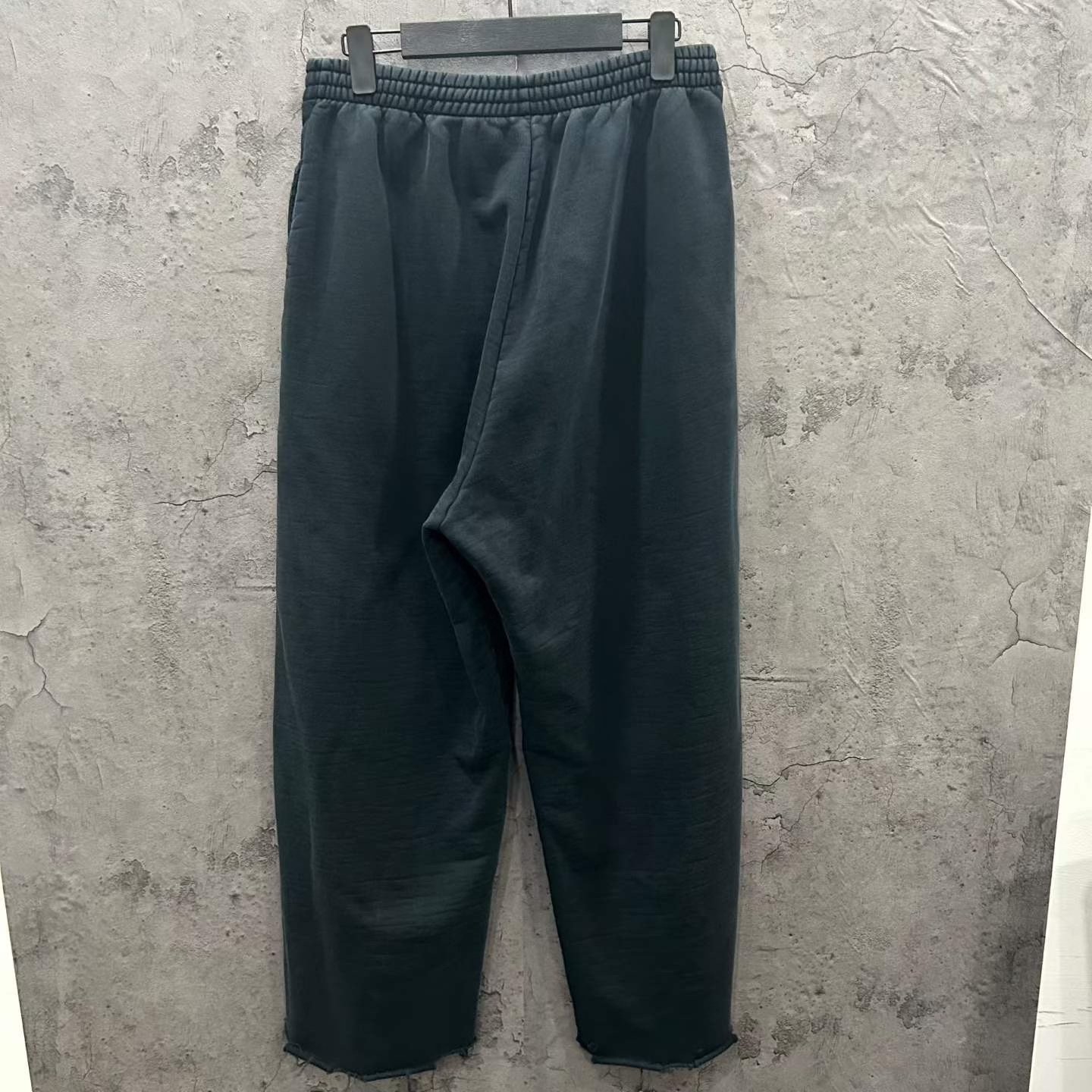 Balenciaga Distressed Embroidered Track Pants — front