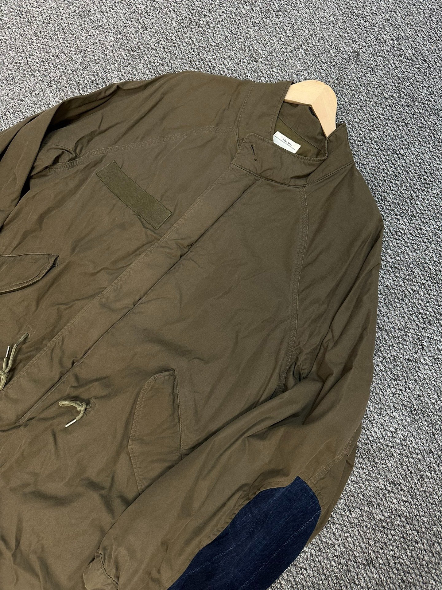 visvim six five mud-dyed patchwork coat — front