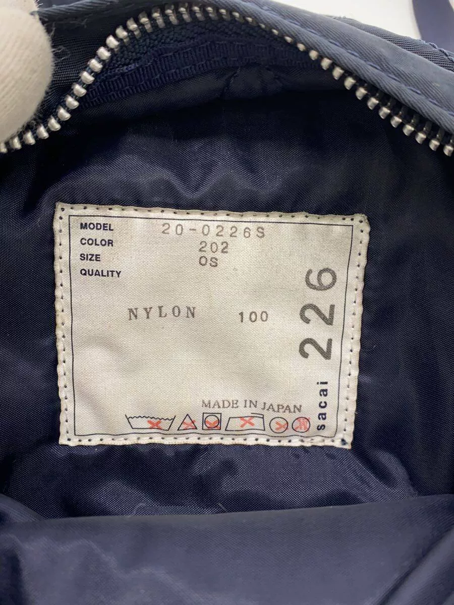 sacai × PORTER Micro Back Pack — label
