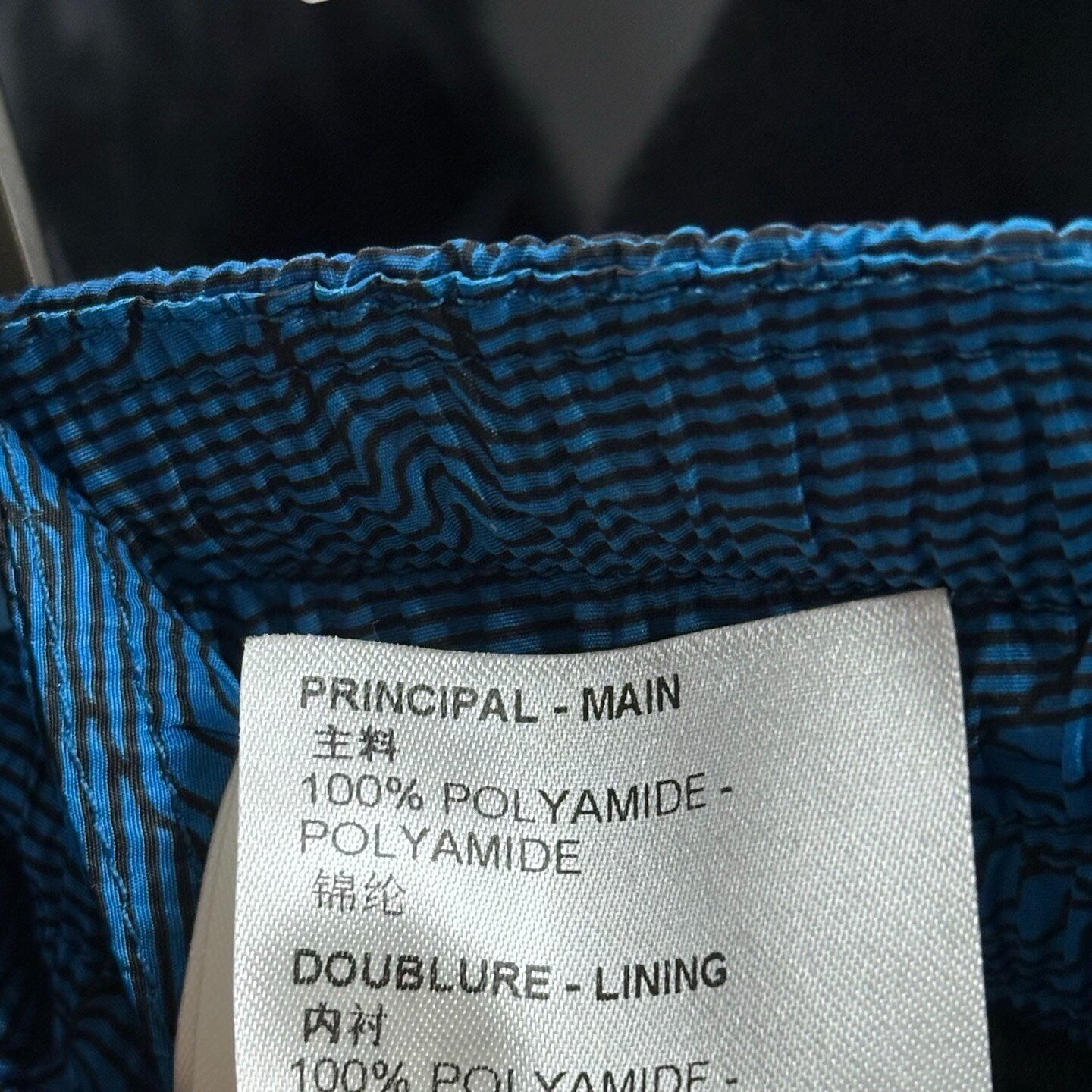 Louis Vuitton Heat-Sensitive Logo Shorts — label