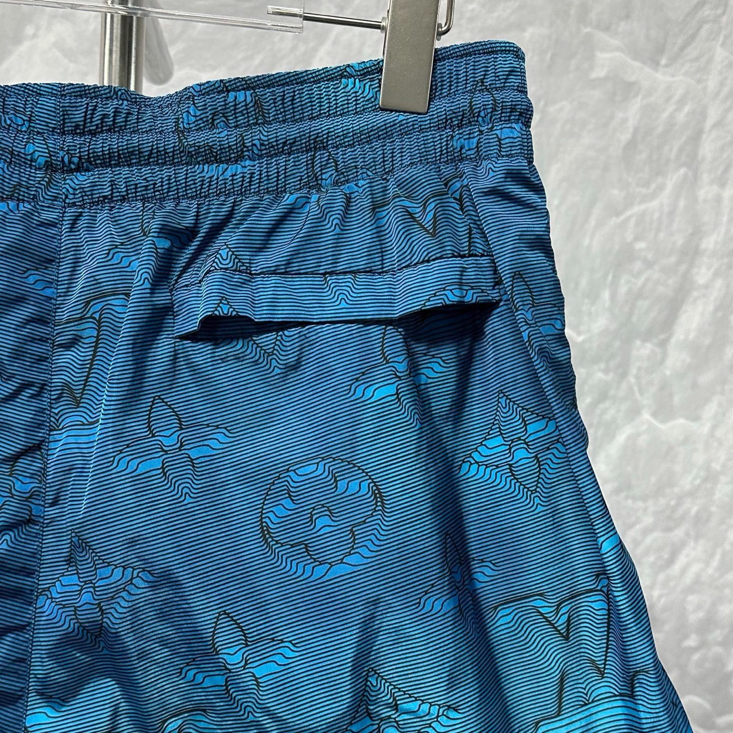 Louis Vuitton Heat-Sensitive Logo Shorts — detail