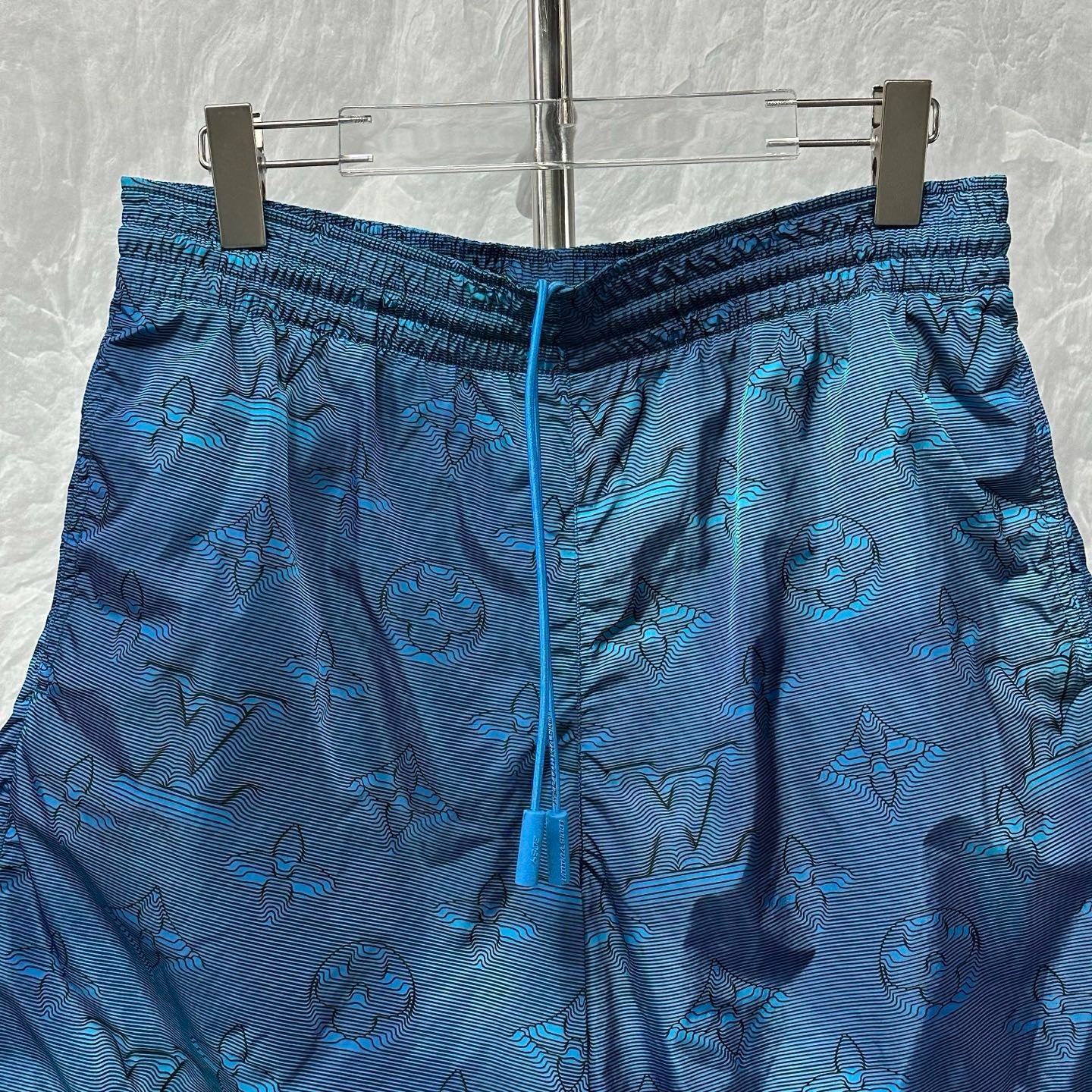 Louis Vuitton Heat-Sensitive Logo Shorts — front