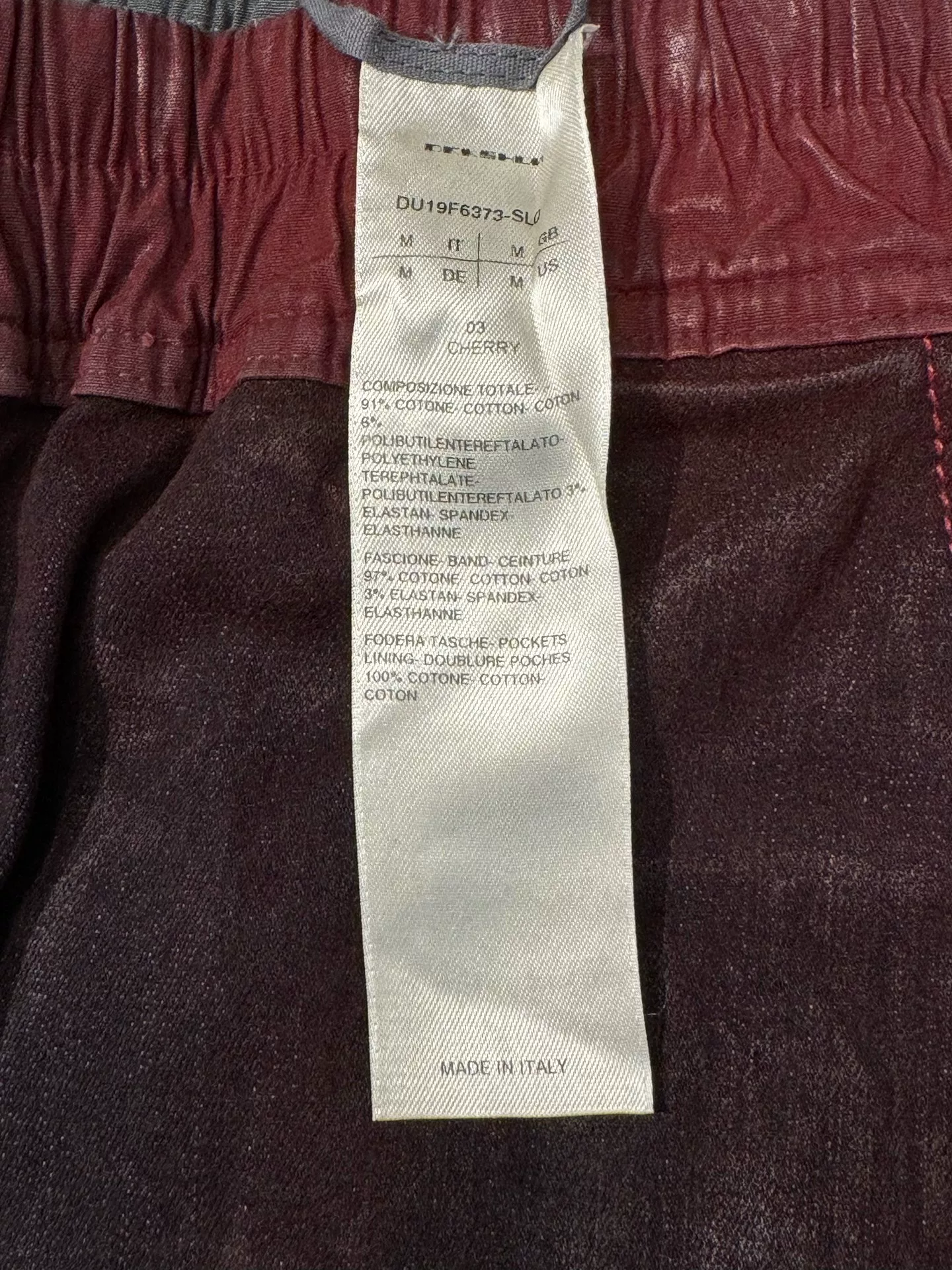 Rick Owens Waxed Coated Cropped Pants — label