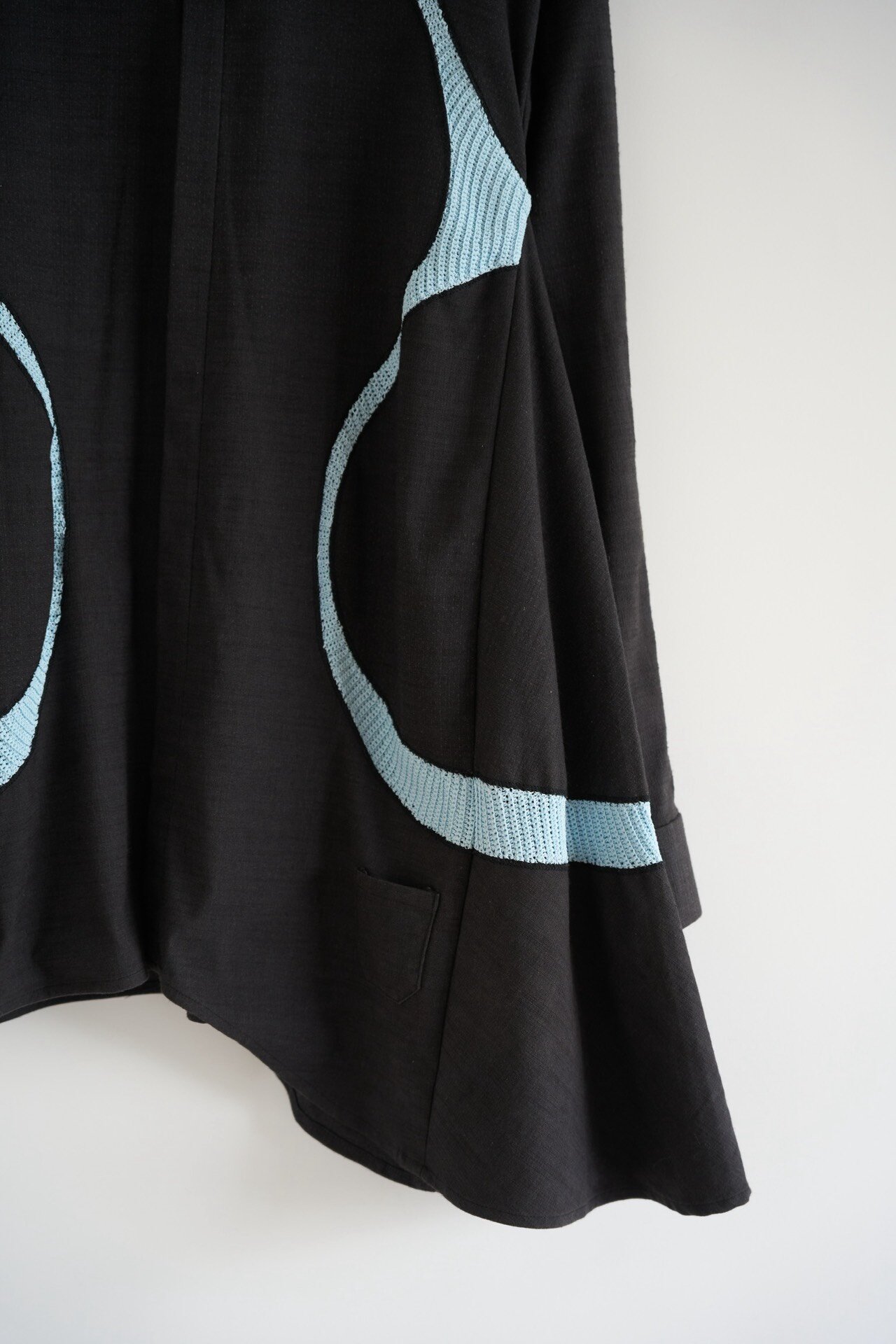 Namesake 21ss Wave Asymmetric Shirt — label