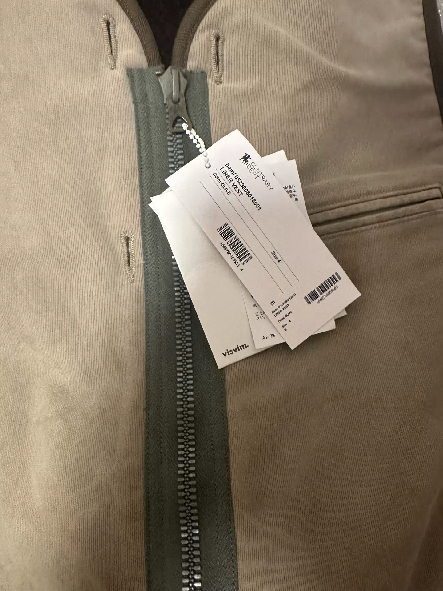 visvim Liner Vest — label
