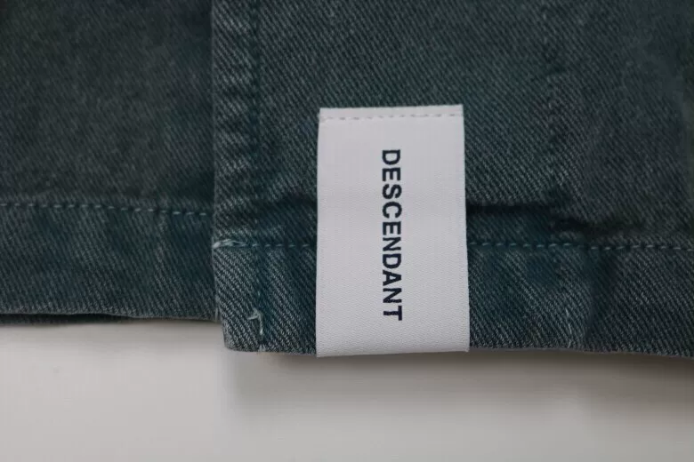 DESCENDANT DWU TWILL JACKET — label