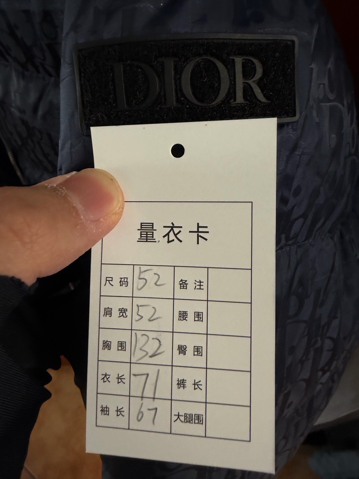 Dior Dark Blue All-Over Logo Puffer Jacket — back