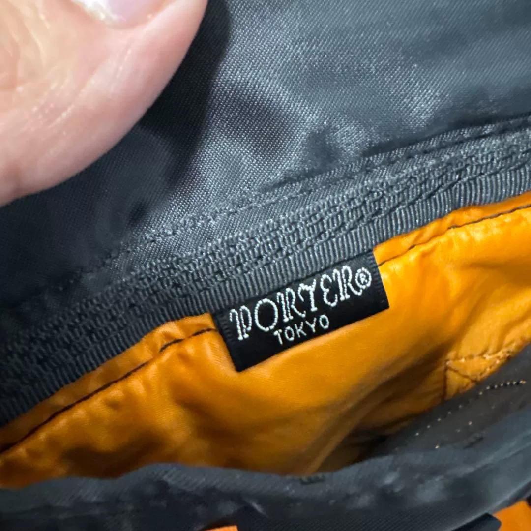 Porter Single-Shoulder Foldable Wallet — label
