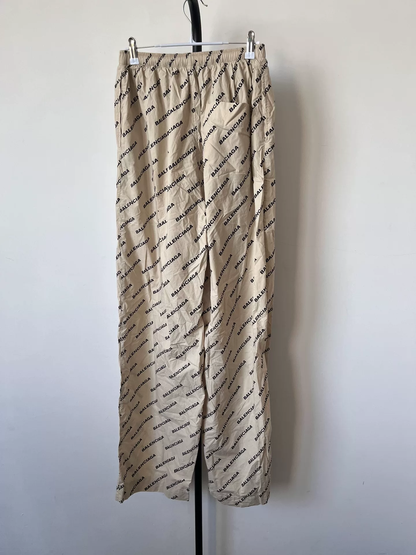 Balenciaga Beige All-Over Logo Pants — front