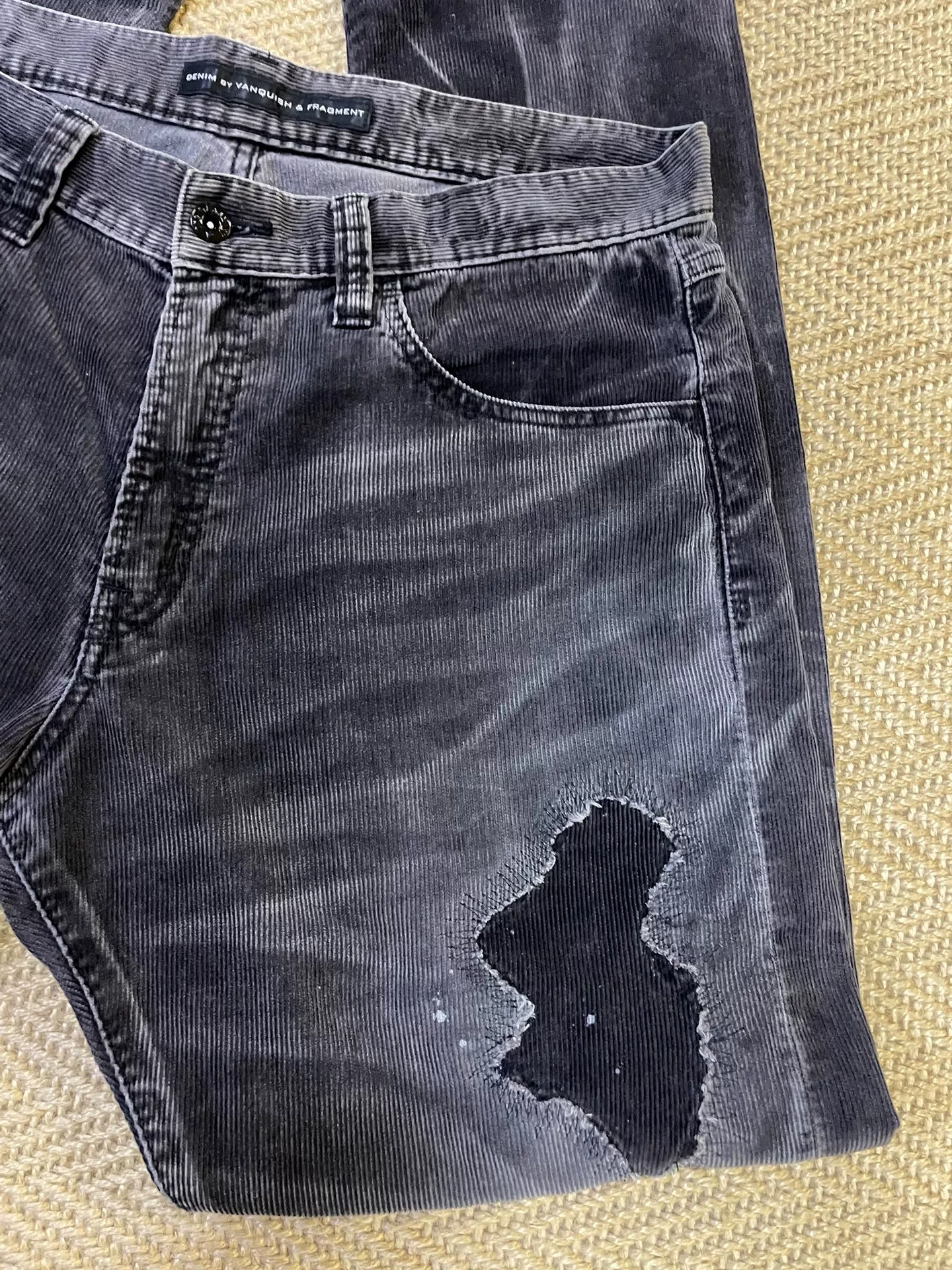 Vanquish & Fragment Distressed Corduroy Pants — label