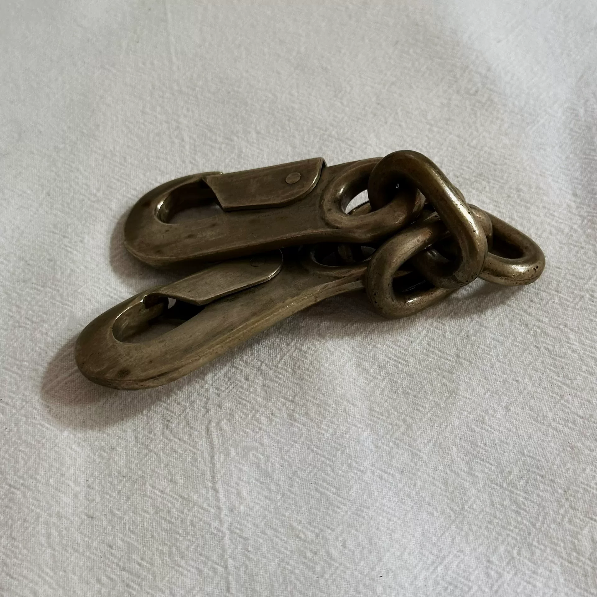 Parts of Four P/4 Solid Brass Double Hook Chain — label