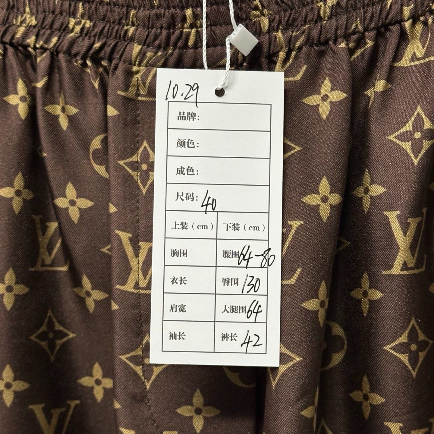 Louis Vuitton Monogram Print Shorts — label