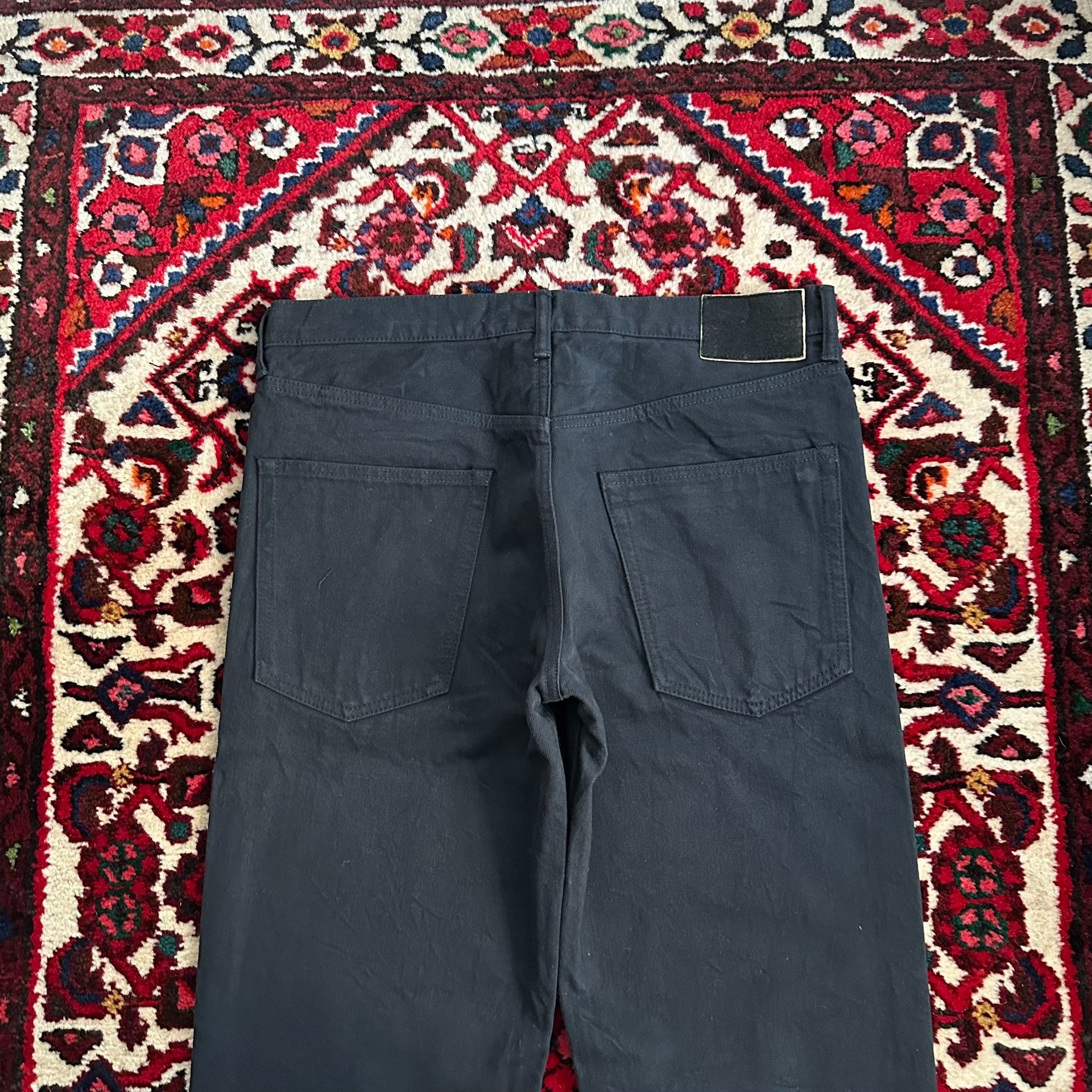 visvim 21AW CMYK Black Wide Jeans — label