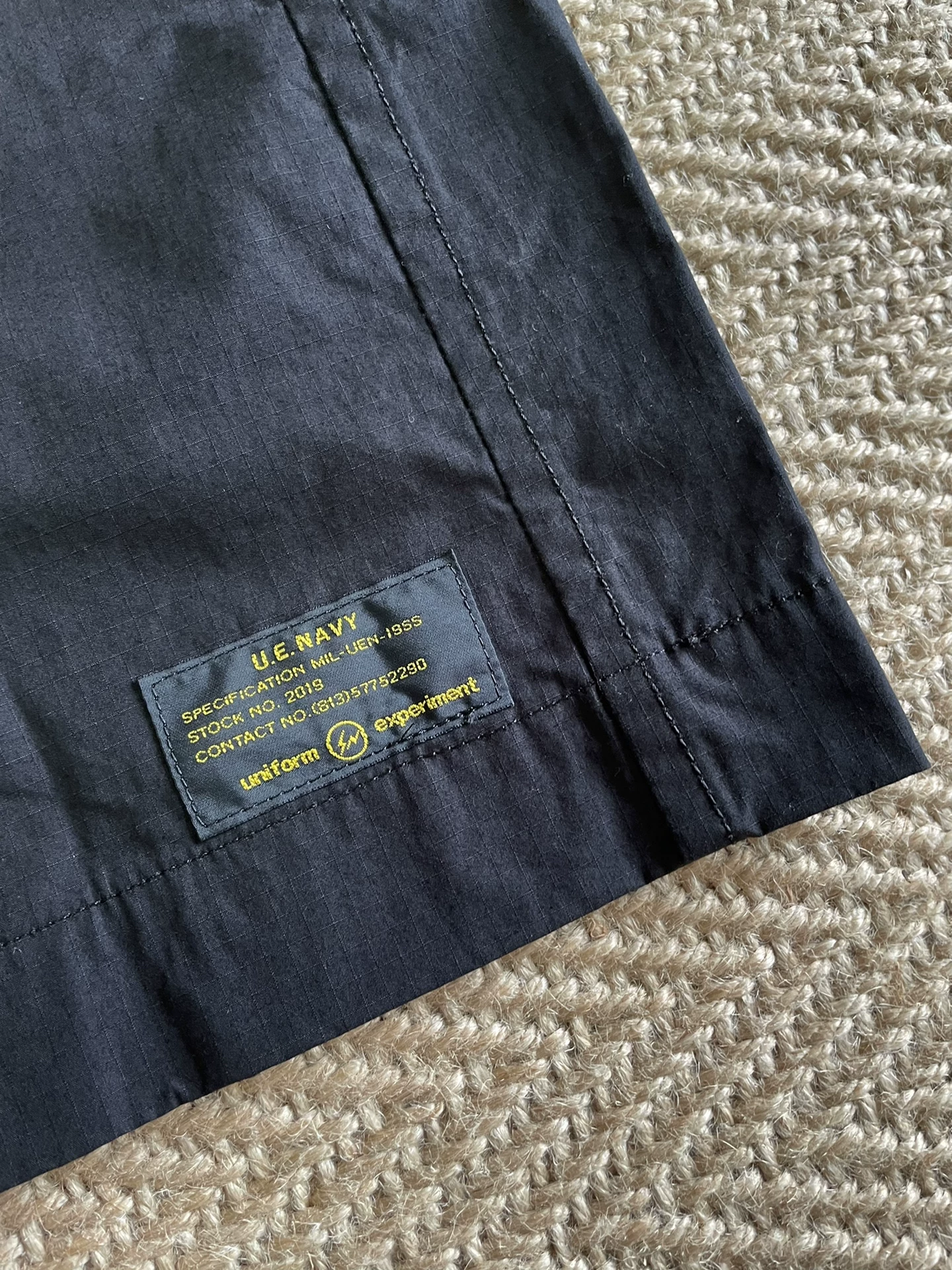 Uniform Experiment UEN MIL Coat — label