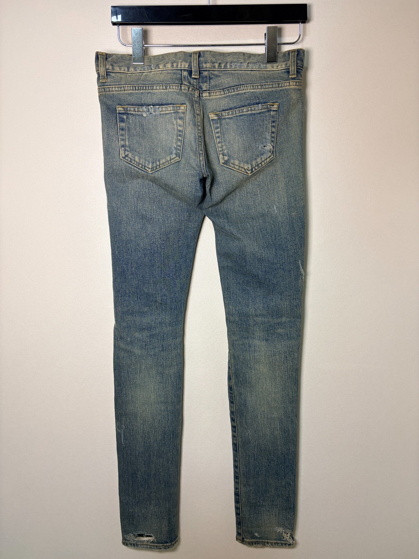 Saint Laurent Distressed Blue Slim Jeans — front