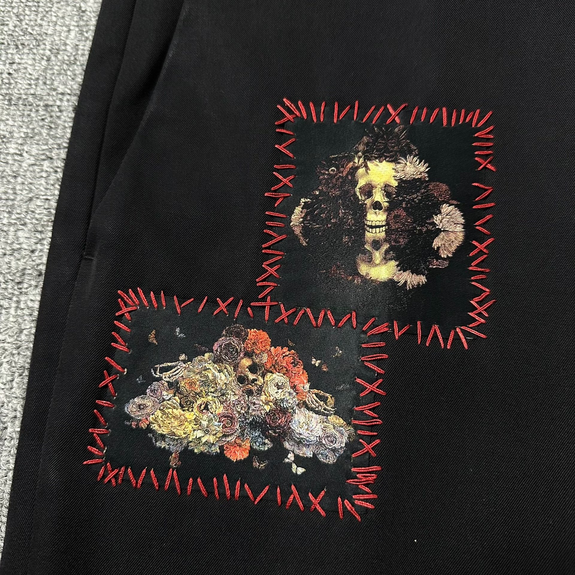 Dior Homme Rose Skull Print Wool Trousers — detail