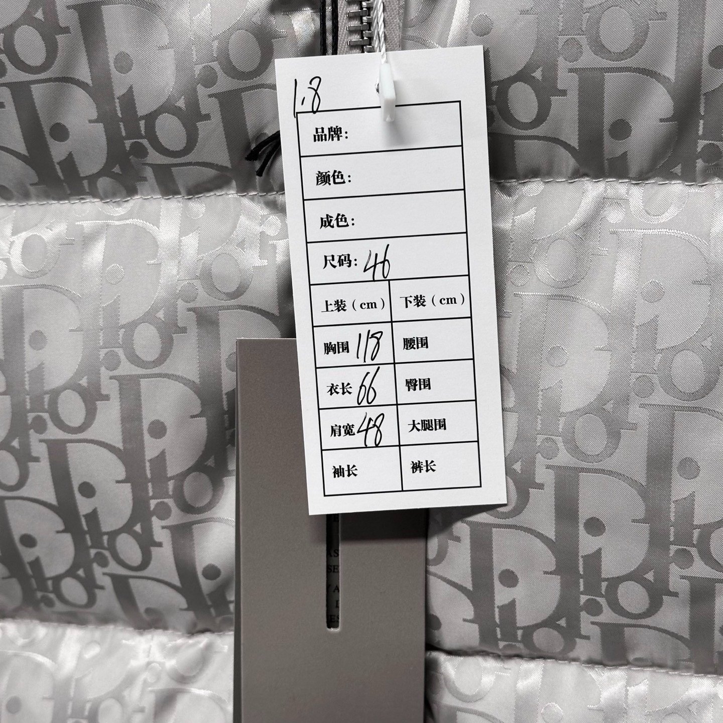 Dior Silver Logo Stand Collar Puffer Jacket — label