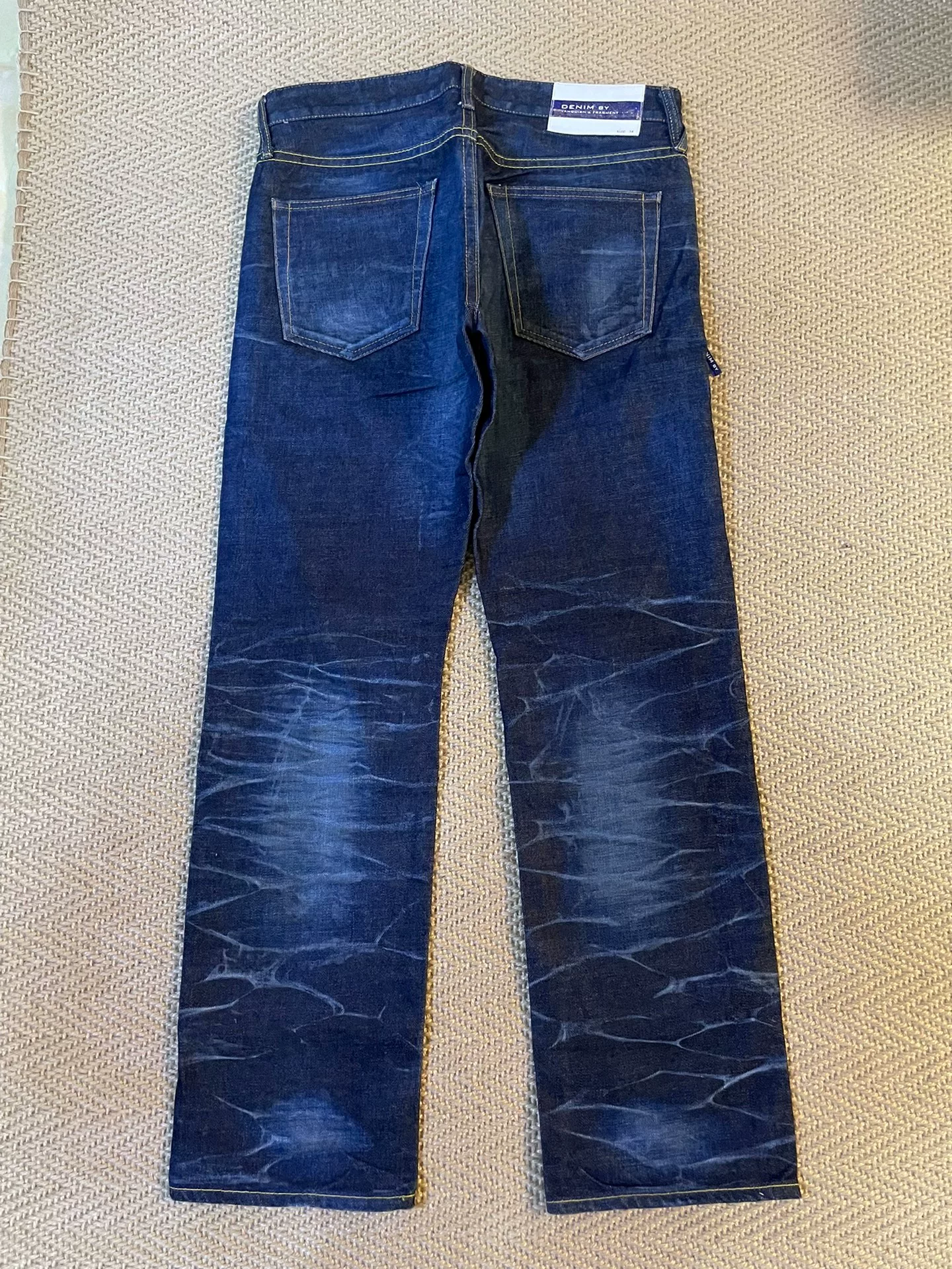 Vanquish & Fragment Denim Jeans — front
