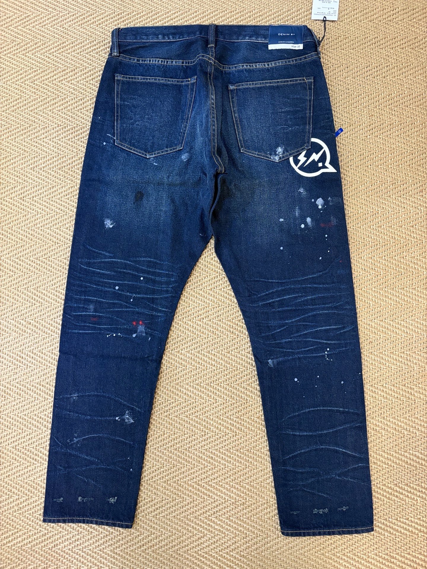 Vanquish & Fragment Lightning Splatter Jeans — front