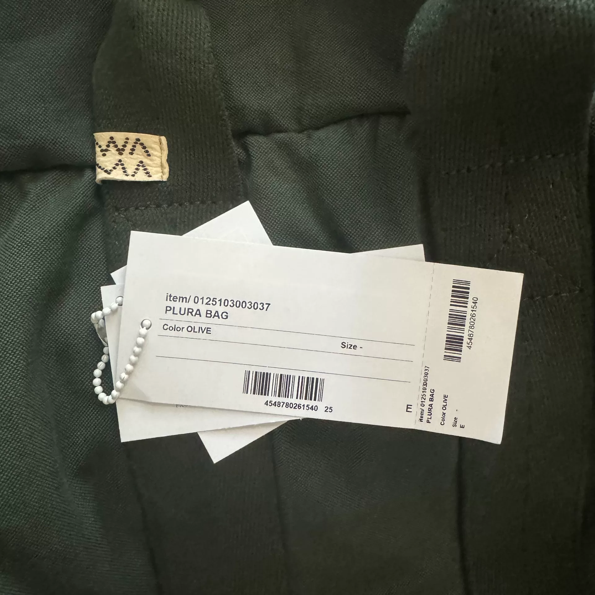 VISVIM 25ss PLURA BAG — label
