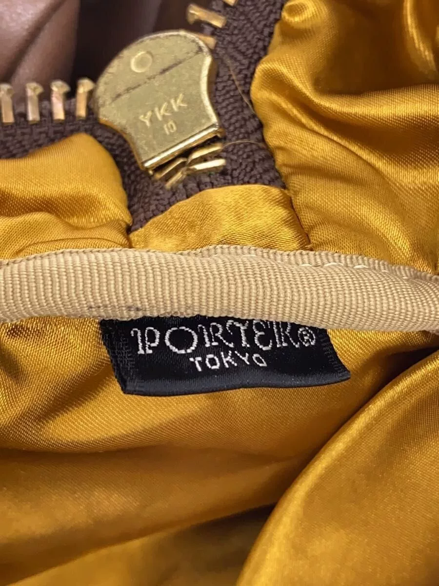 PORTER Brown Leather Boston Bag — label