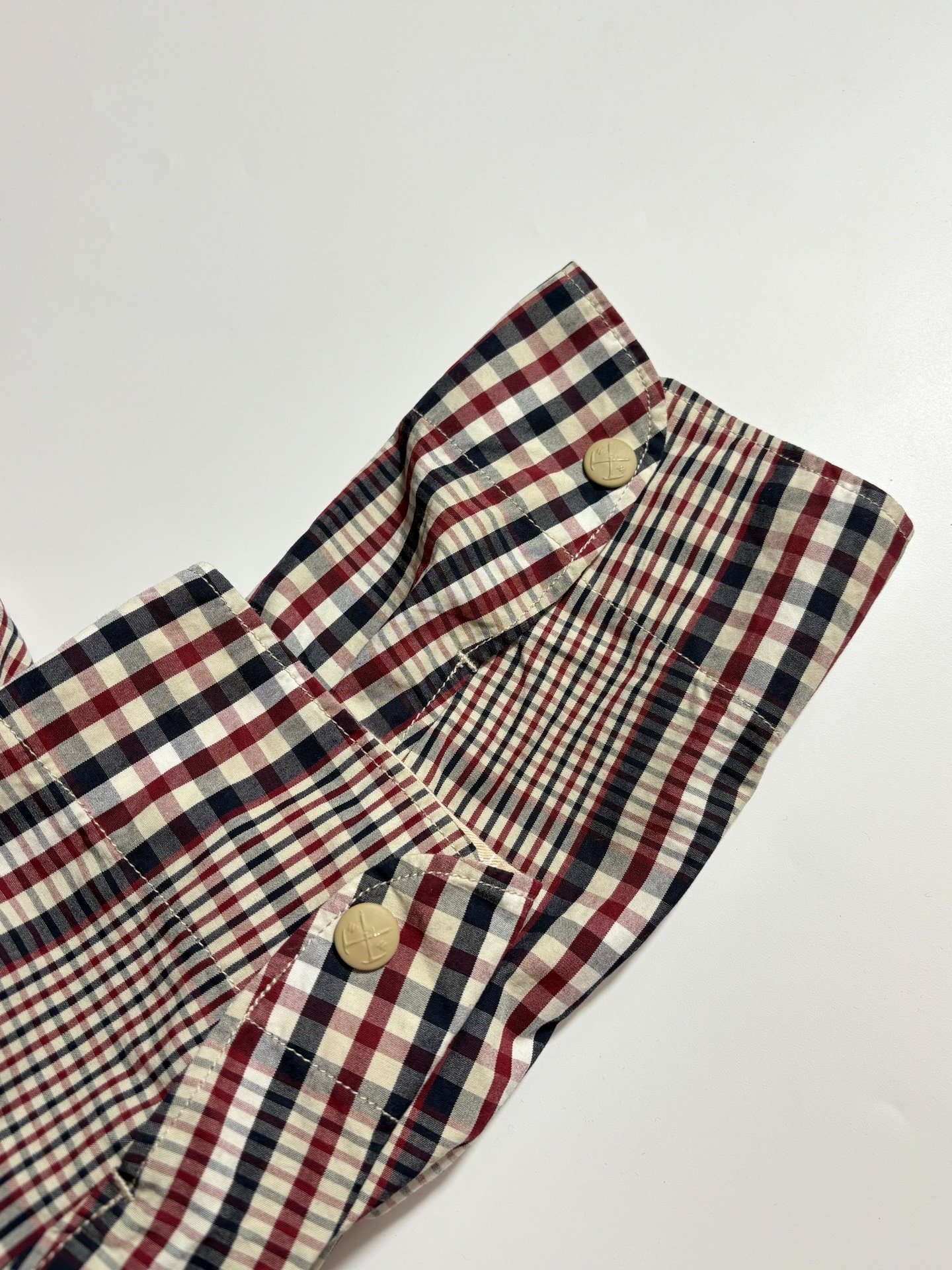 White Mountaineering Checkered Jacket — label