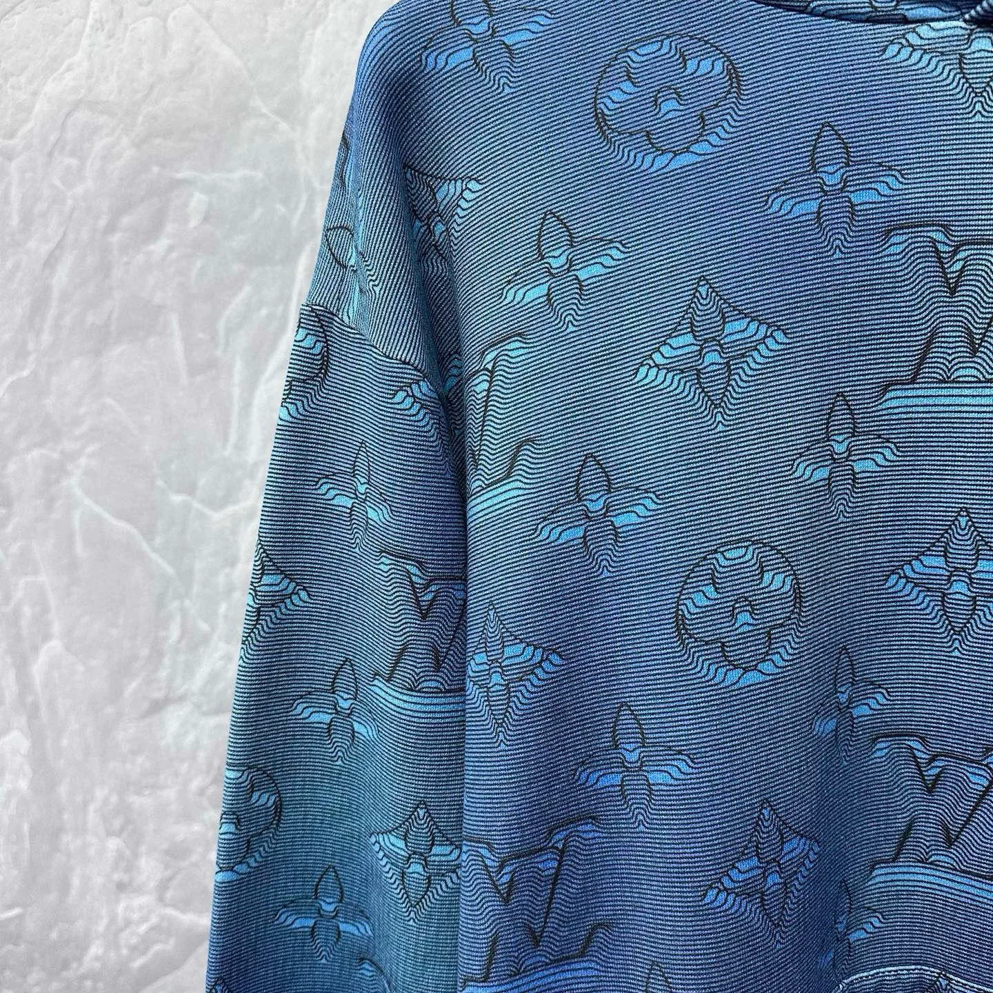 Louis Vuitton Heat-Sensitive Logo Hoodie — detail
