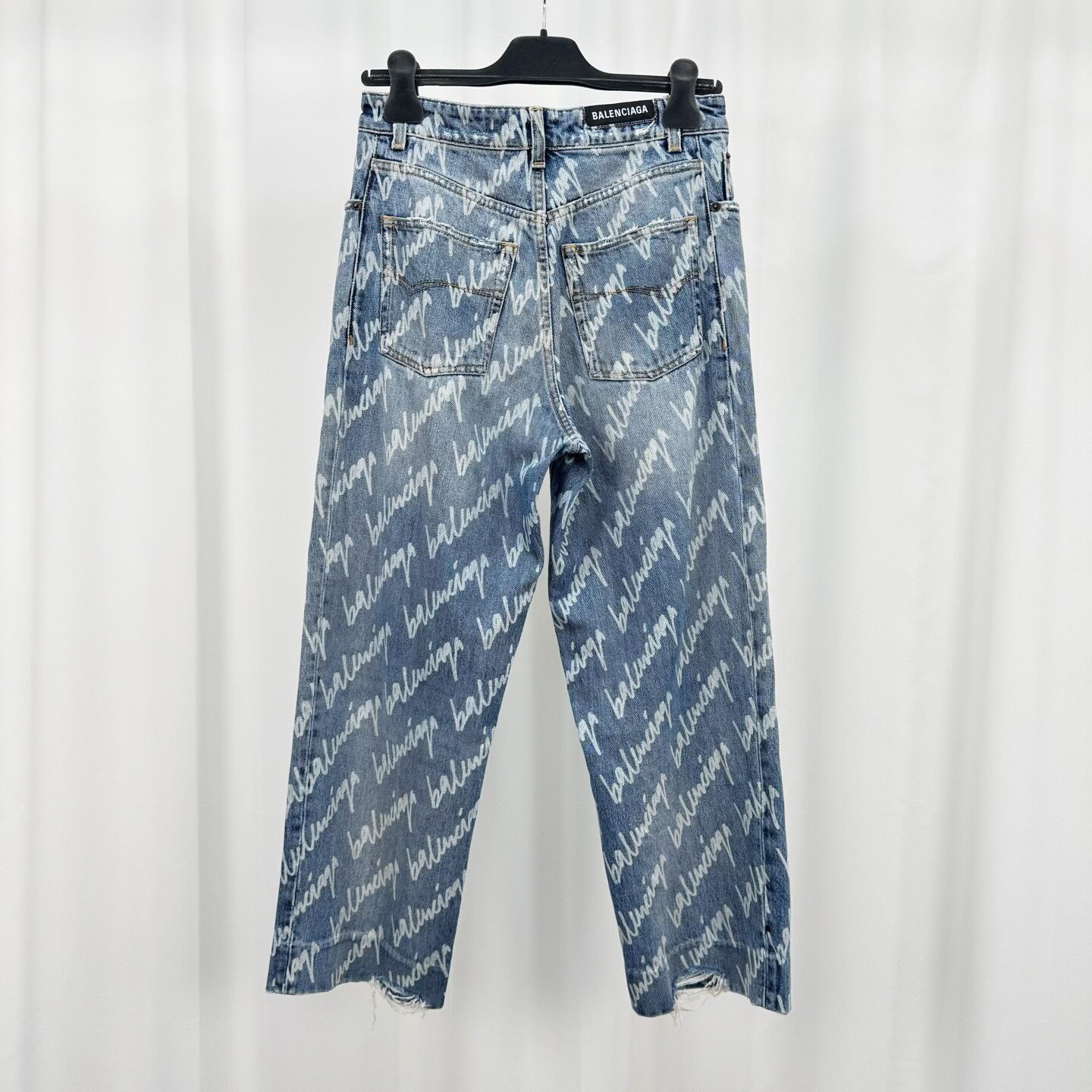 Balenciaga Cursive Lettering All-Over Jeans — front