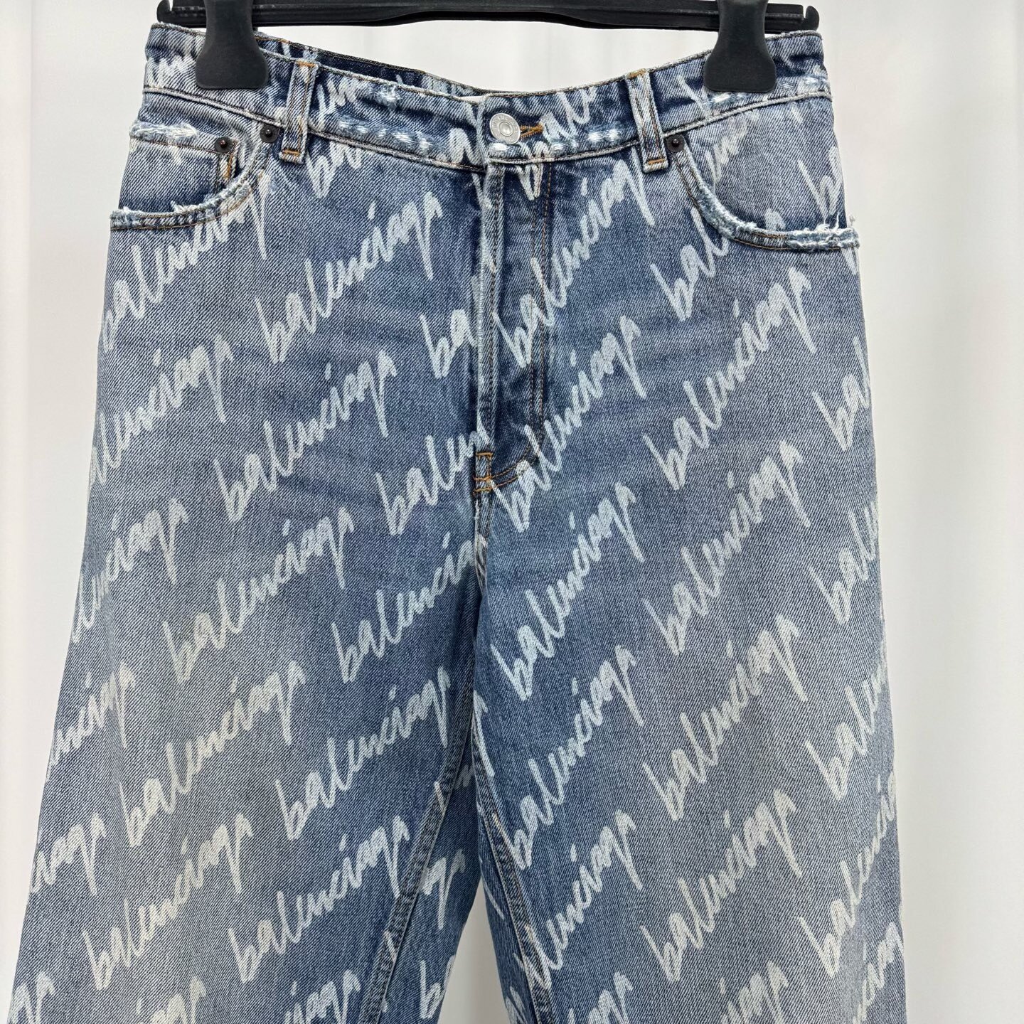 Balenciaga Cursive Lettering All-Over Jeans — detail