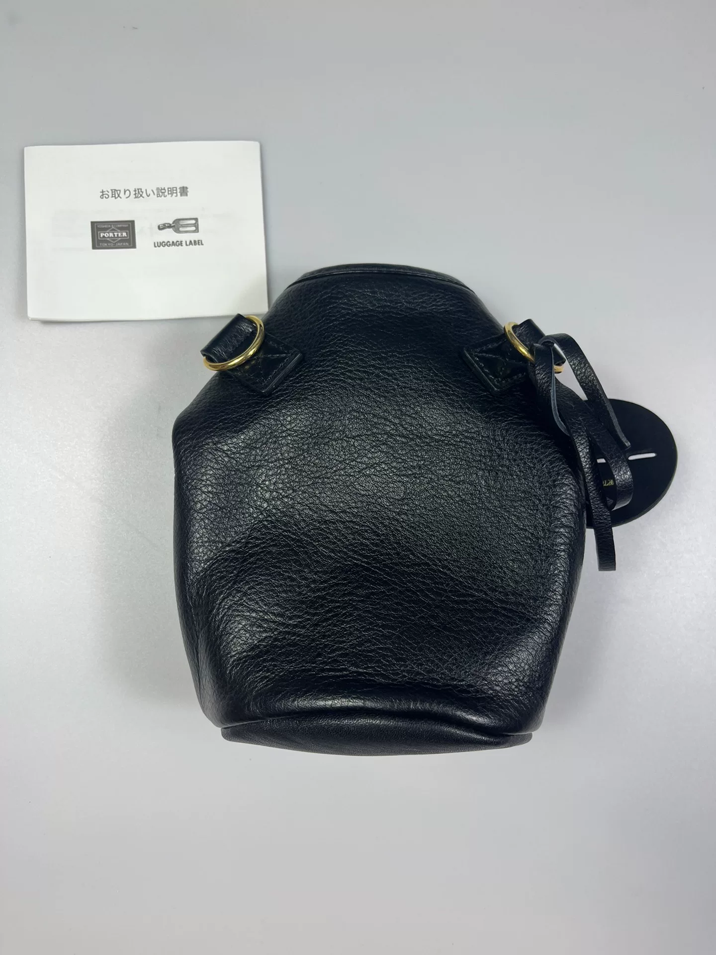 Porter Small Black Leather Crossbody Bag — label
